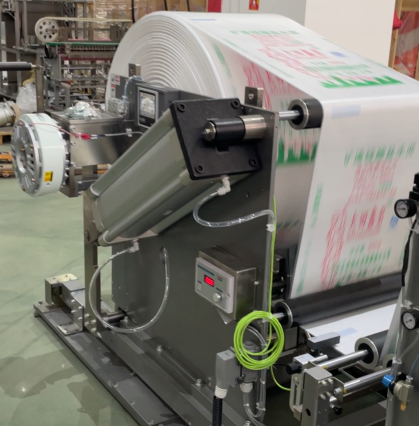 Bag unwinding device automatic valve sack making machine