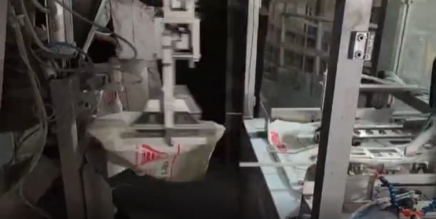 cement sack inserting intelligent equipment